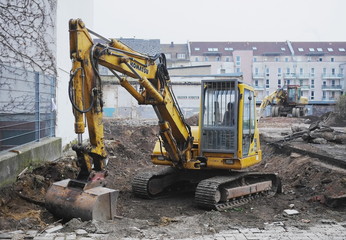 Excavator on an urban building site