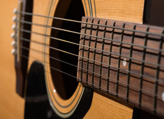 Obraz premium classical acoustic guitar close up isolated on a white backgroun
