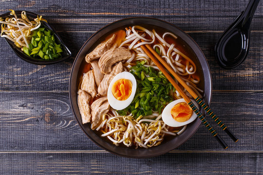 Japanese Ramen Soup With Chicken, Egg, Chives And Sprout.