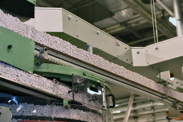 Cigarettes production line in a tobacco factory
