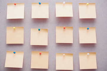 Sticky notes on a bulletin board