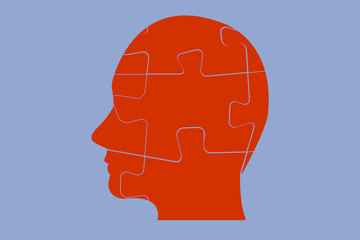 Side view of man`s head of red puzzle