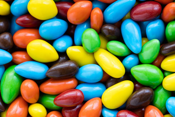 Colorful background of assorted multicolored coated sunflower se