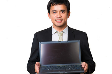 Young handsome man hold laptop in black suit smiling