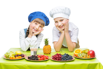 Children making fruit snacks