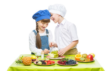 Children making fruit snacks