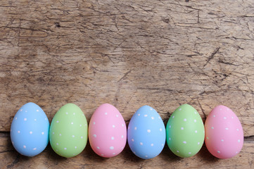 Easter eggs on wooden background