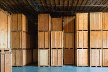 Photo sur Plexiglas Bâtiment industriel Clean Storage Warehouse with Custom Crates. Storage solutions with crates made of wood interior. Logistics and Distribution  