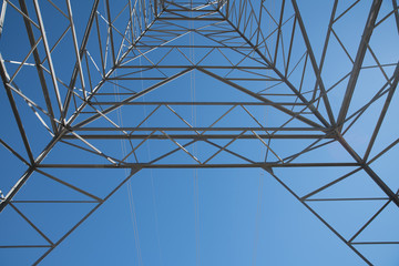Electricity Tower In California. Inside shot of a electricity tower in California carrying sustainable power from windmill generation of sustainable energy.
