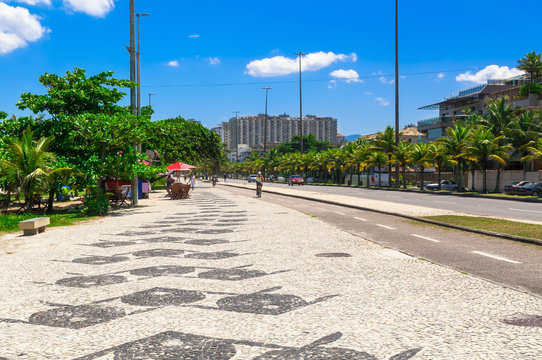Barra da Tijuca beach with mosaic of sidewalk  in Rio de Janeiro. Brazil