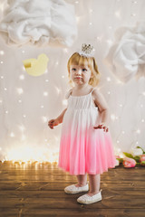 Little Princess on a background of lights and clouds 5357.