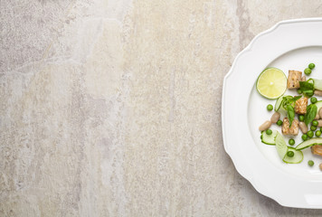 Fresh spring salad with salmon and vegetables. Top view. 