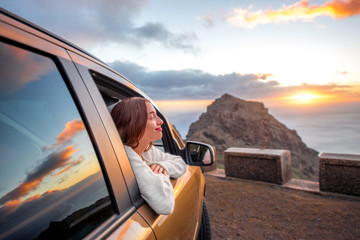 Woman traveling by car on La Gomera island - obrazy, fototapety, plakaty