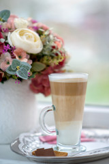 Coffee Latte in Transparent Glass silver in Cafe, Latte Macchiat