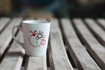 a Cup of coffee on wooden table