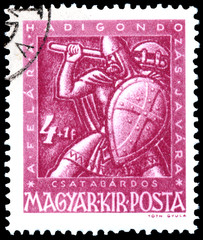 Stamp printed by Hungary, shows shows warrior with shield and ba