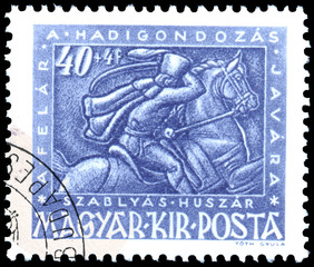 Stamp printed by Hungary, shows gallant on horseback