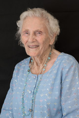 Smiling happy elderly lady portrait