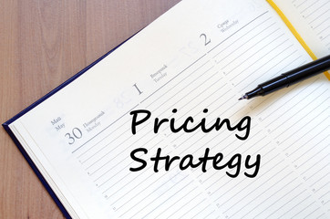 Pricing strategy write on notebook