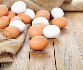 Eggs on wooden background