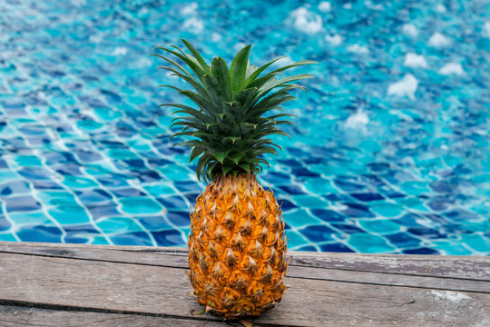 Healthy diet food. Pineapple at the swimming pool