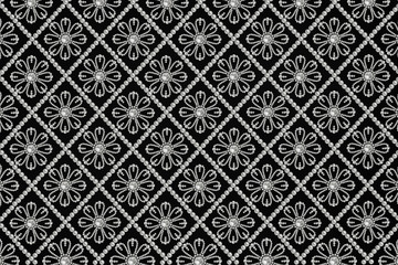 black background with white pearls pattern closeup