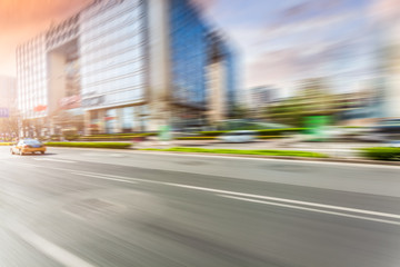 Fototapeta na wymiar Car driving on road, motion blur