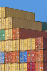 stack of Colorful Cargo Containers. Industrial Background.