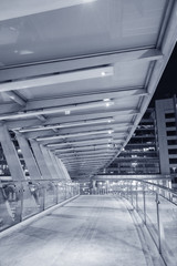 Empty pedestrian transition over busy street in urban city