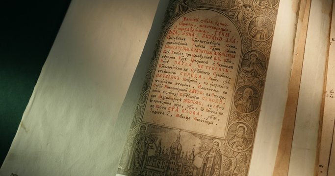 Old Book Paterik of Kiev-Pecherska Lavra Old-Slavic Style of Writing Engravings Pictures Episodes from the Life of Saints Monks Turning Pages of Book