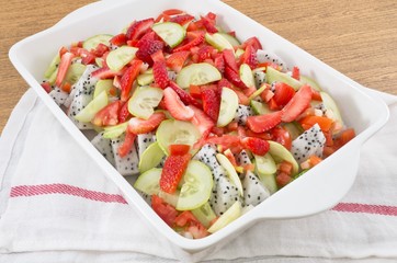 Ceramic Tray with Delicious Fresh Fruits Salad