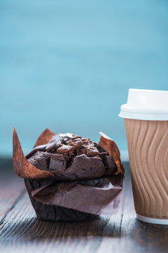 Take away coffe and chocolate muffin
