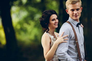 Obraz premium Beautiful wedding couple posing