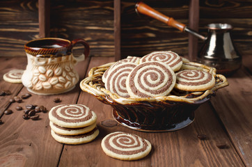 Cookies in the form of a spiral on a wooden table