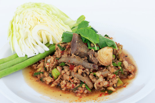 Thai ground pork salad, Spicy minced pork and pork liver salad (Larb Mu) on white background