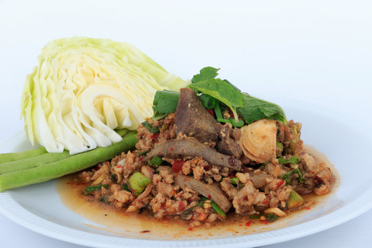 Thai ground pork salad, Spicy minced pork and pork liver salad (Larb Mu) on white background