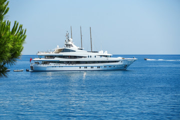 Fototapeta na wymiar Luxury yacht sailing in Mediterranean Sea near French Riviera, M