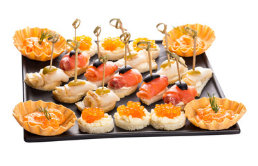 set canapes with different fish and caviar