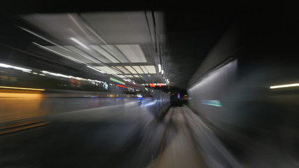 Reflection of subway tunnel in train's window