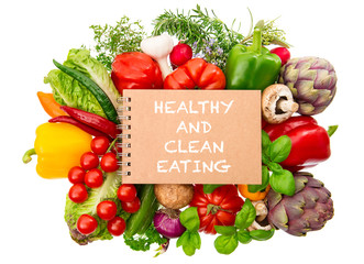 Notebook fresh organic vegetables herbs. Healthy clean eating