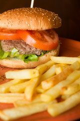 Hamburger salad and tomatoes with fried potatoes