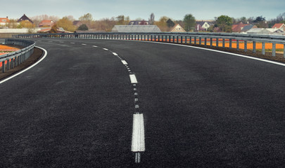 Fototapeta premium Road in the Fields of Tulips in Netherlands