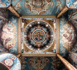 Fototapeta na wymiar Bottom View. Romanian Orthodox Church interior with painted wall. 