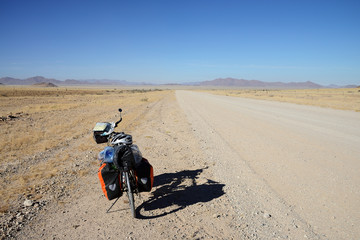 Obraz na płótnie Canvas Long distance cycling in the Namib Naukluft National Park, Namibia