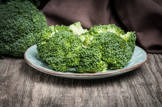 Full plate of raw broccoli 