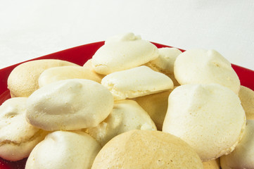 red plate with meringues
