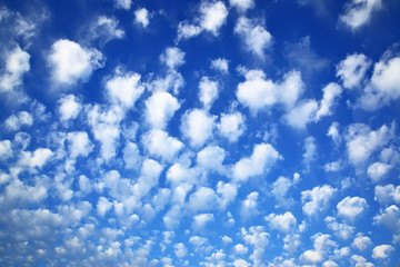 Deep blue sky with clouds