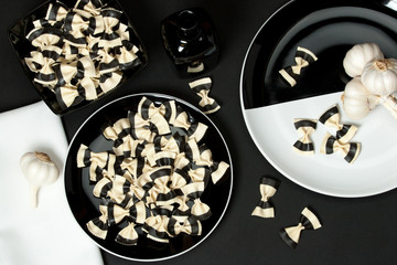 Italian Farfalle Durum Wheat Pasta With Cuttlefish Ink. Black An