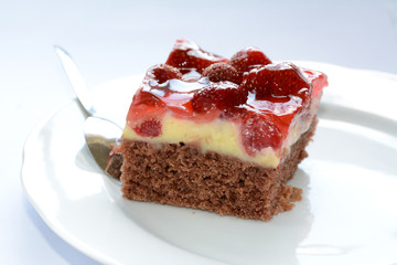 Fresh tasty strawberry cake on a plate