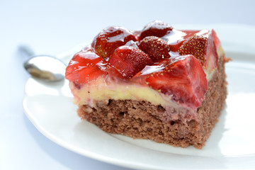 Fresh tasty strawberry cake on a plate